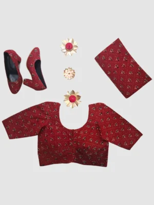 Handblock-printed cotton with small all-over floral motifs and dotted detailing.