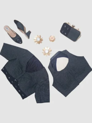 Handloom cotton with micro-checks and subtle Ikat-inspired border detailing