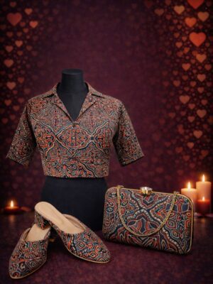 Handblock-printed cotton with small all-over floral motifs and dotted detailing.